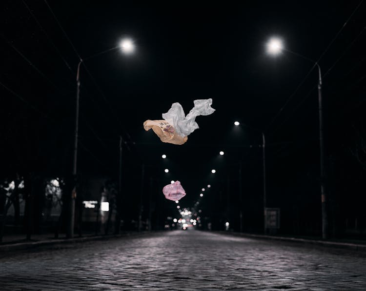 Cloth Flying In Air On Dark City Street