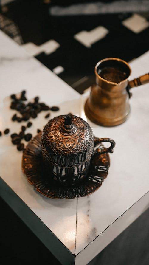 Free Black and Gold Ceramic Teapot Stock Photo