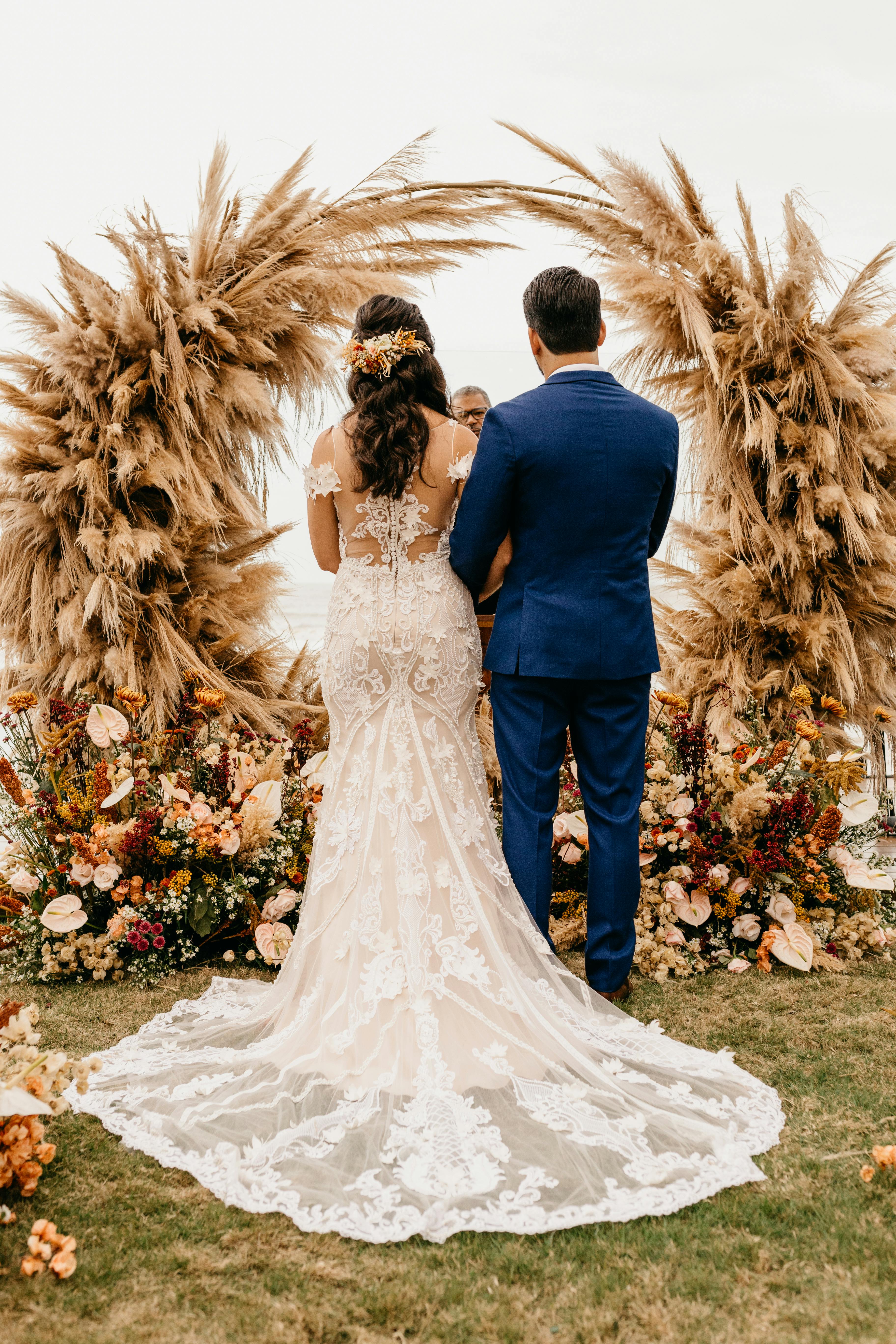 couple in front of the altar at an outdoor wedding