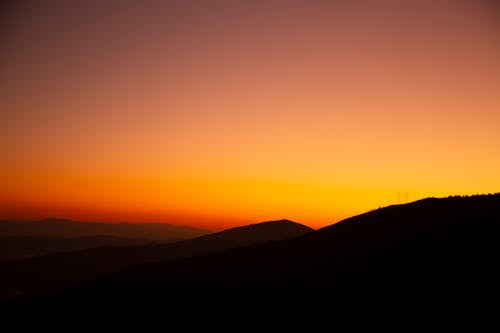ฟรี คลังภาพถ่ายฟรี ของ ซิลูเอตต์, ตะวันลับฟ้า, ท้องฟ้าสีส้ม คลังภาพถ่าย