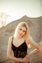 Blonde Woman in Lacy Black Crop Top