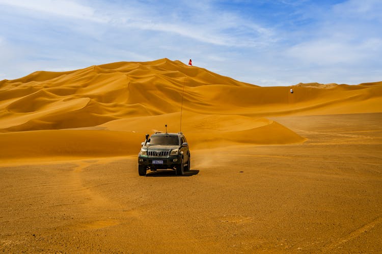 A Black Car On A Desert