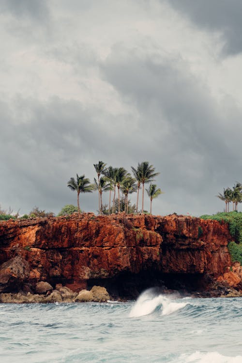 Free A Cliff by the Seaside on a Cloudy Day Stock Photo