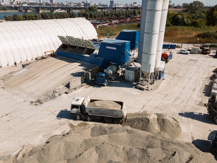 Trucks Working On Construction Site