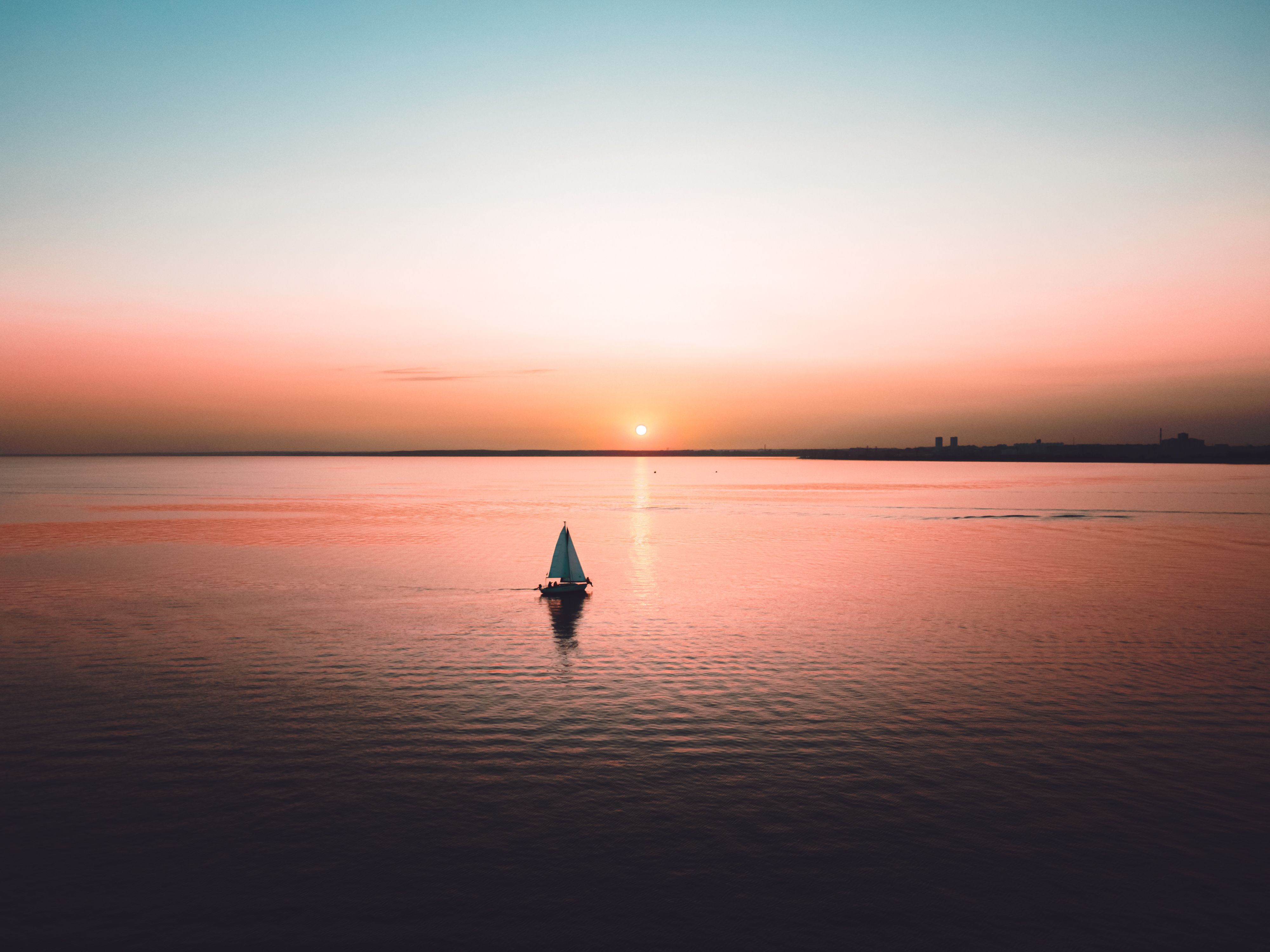 Photo of a Person on Boat During Golden Hour · Free Stock Photo