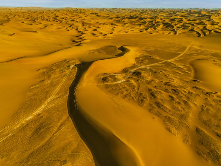 Vehicles Tracks In The Kumtag Desert, China