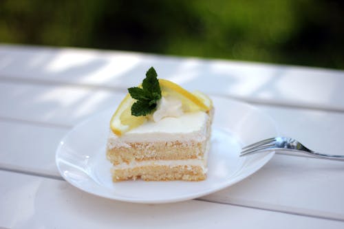 A Piece of Lemon Cake on a Ceramic Plate 