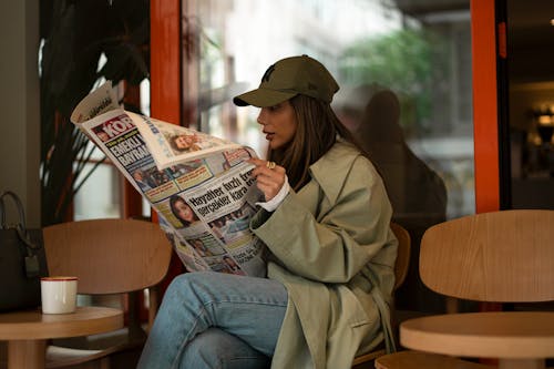 Woman Reading a Newspaper