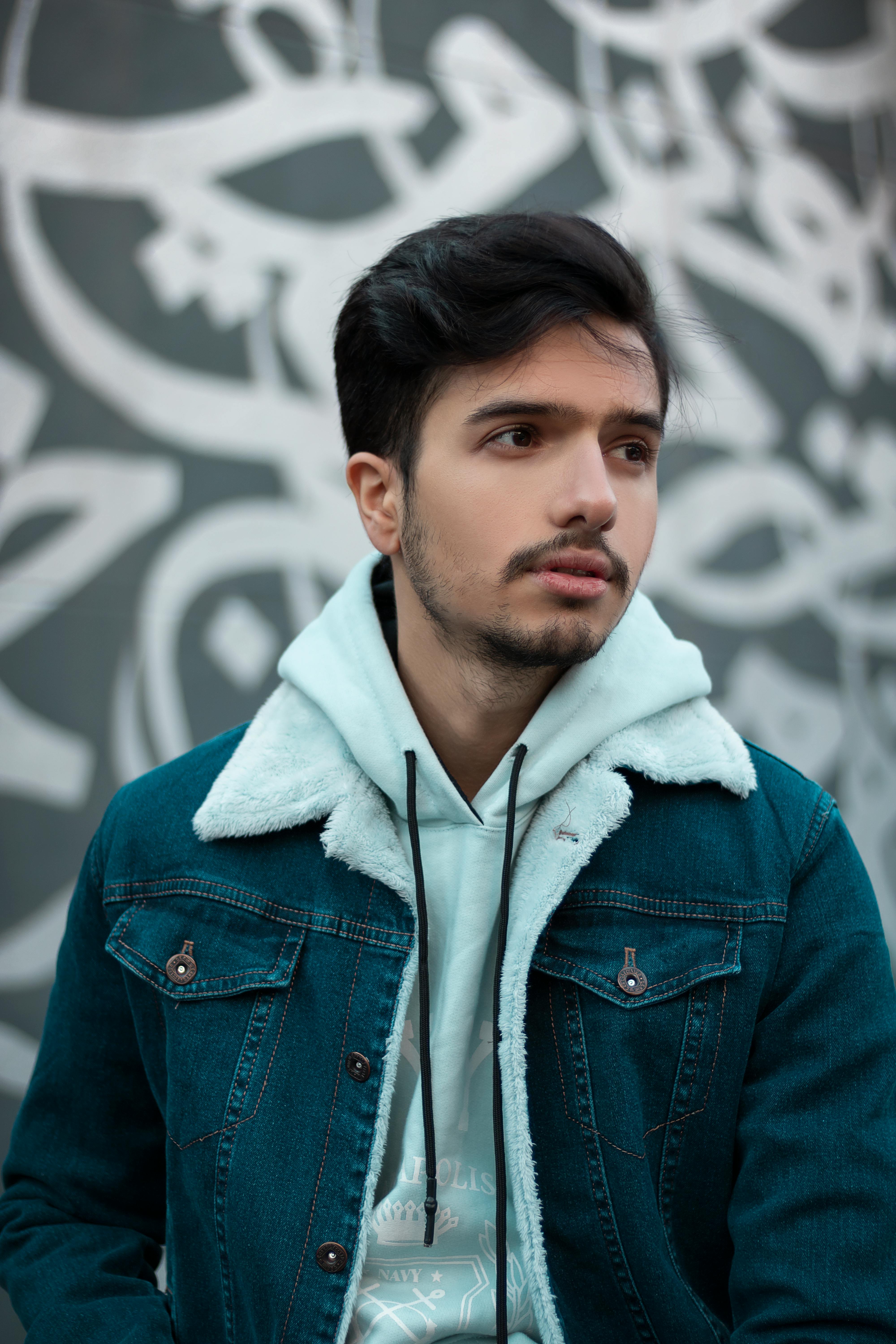 Download A Young Man In A Blue Denim Jacket