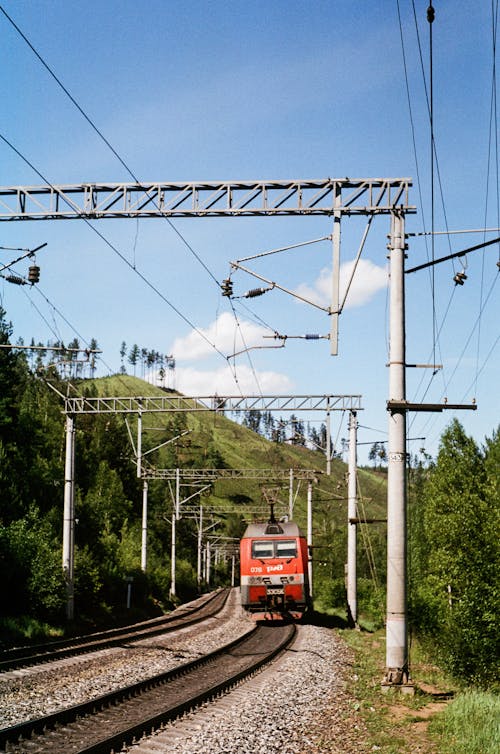 Red Train on a Railroad Track