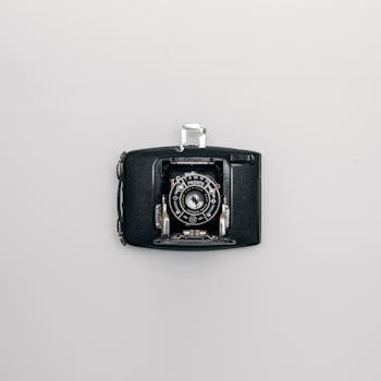 Antique Pronto camera captured in a classic flat lay style on a white background.