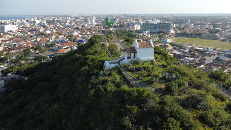 Brazilian Flag On Hill In City