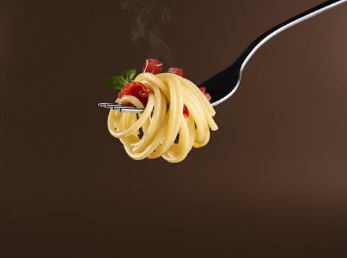 Free Close-Up Shot of Spaghetti on Silver Fork Stock Photo