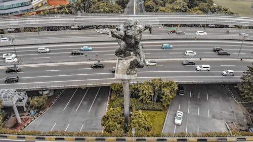Free Aerial view of Dirgantara statue also known as Tugu Pancoran Monument is an iconic Indonesa National Monument Stock Photo