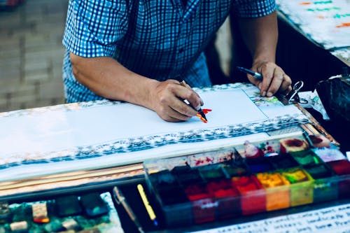 Man In Blue And Black Button-down Top