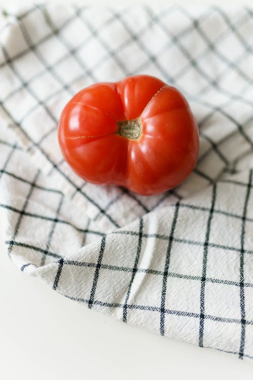 Free Tomato on Kitchen Cloth Stock Photo