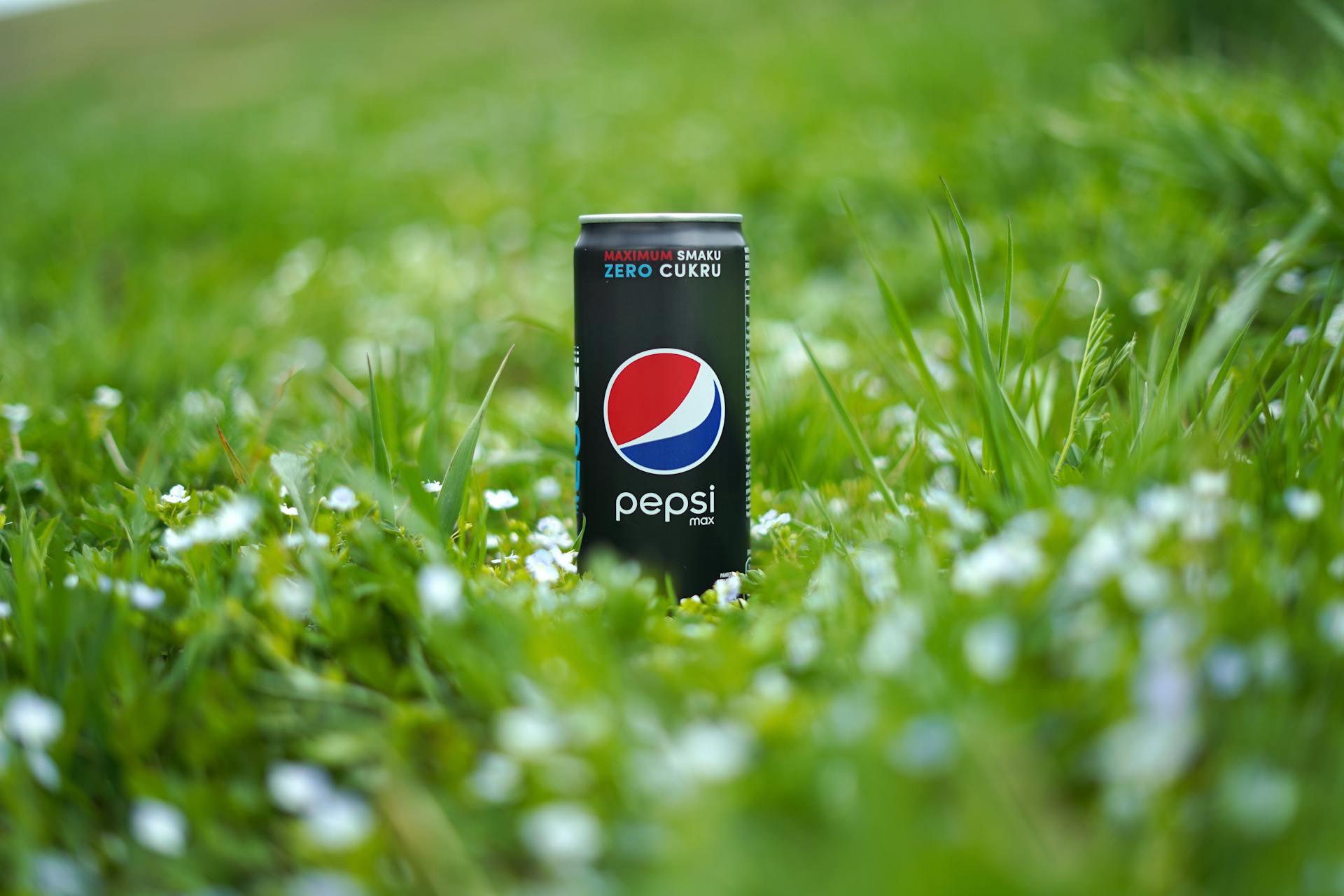 A Can of Pepsi Max in the Grass