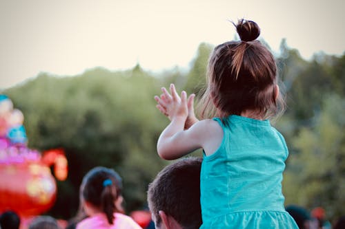 Free Shallow Focus Photography Of Girl Clapping Stock Photo