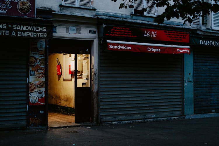 A Closed Storefront Of A Cafe