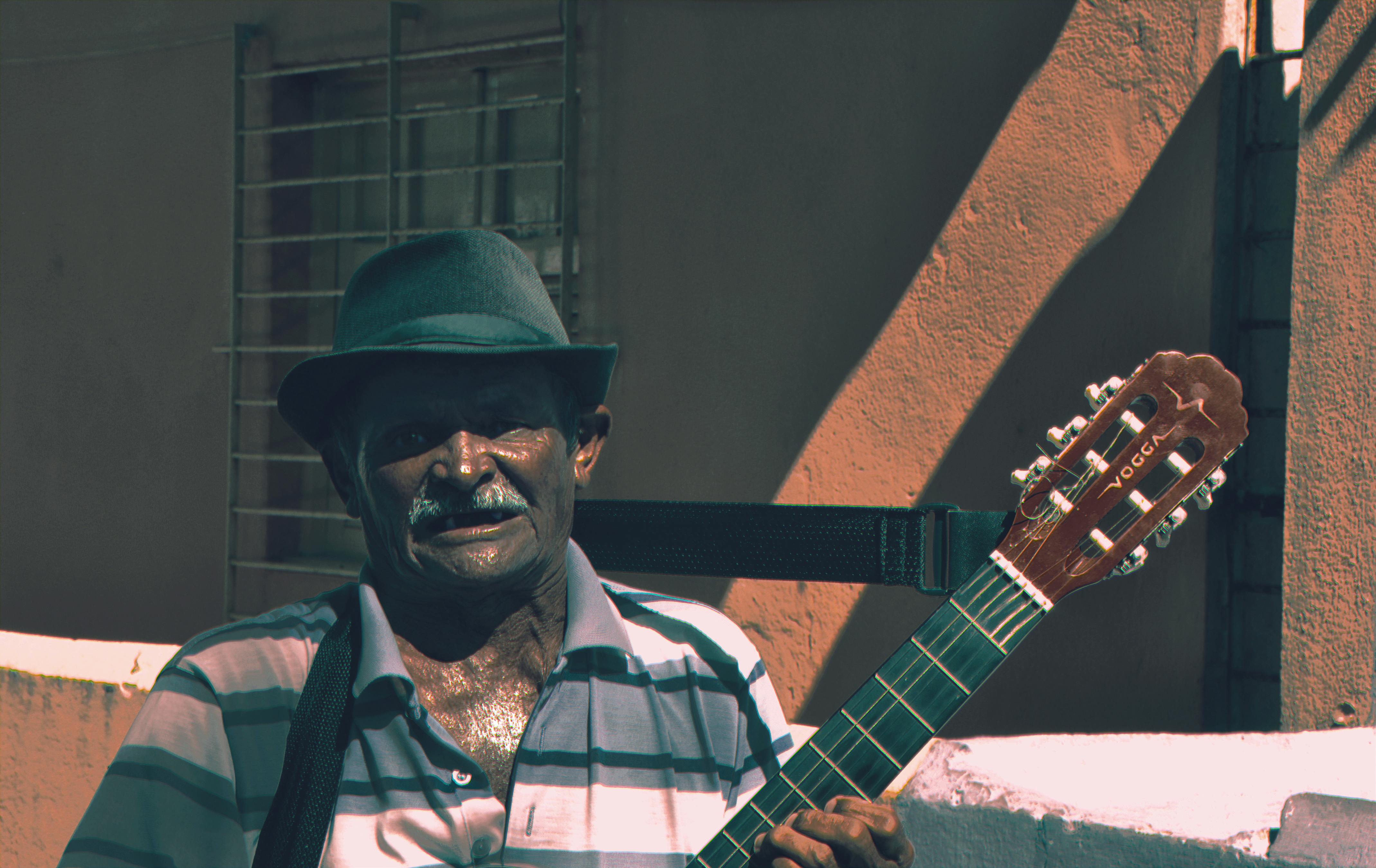 man playing classical guitar