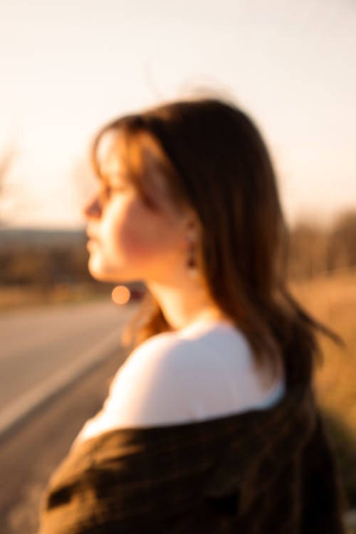 Blurry Photo of a Woman on the Roadside