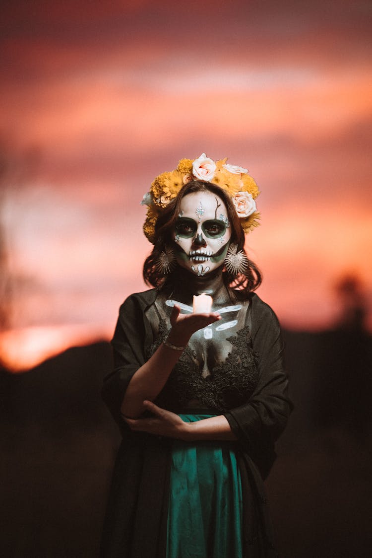 Photo Of A Woman Wearing A Mask Of The Death