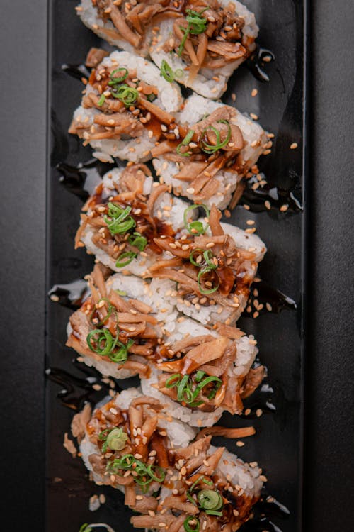 Sushi on Black Rectangular Plate