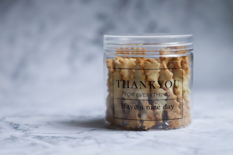 crumbled bacon bits in a small container