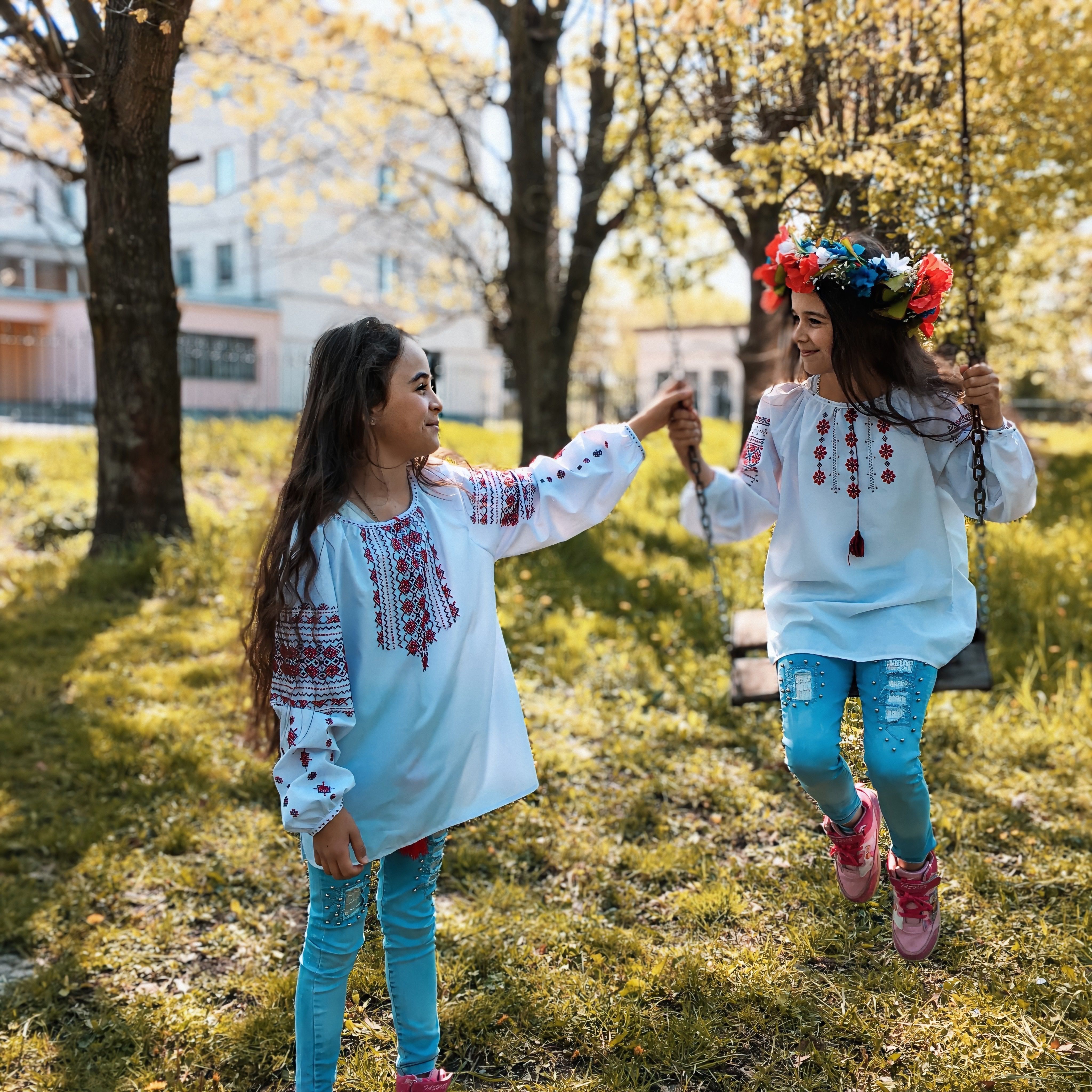 Little Girls Playing Outside on a Swing&nbsp;