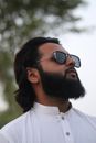 Man in White Shirt Wearing Black Sunglasses