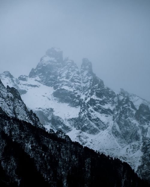 Free Captivating winter landscape featuring snow-covered peaks in Dombay, Russia. Stock Photo