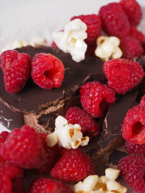 Free Red Raspberries on Top of  Chocolate Cake Stock Photo
