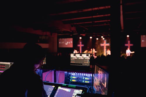 Woman Mixing Music in a Club 