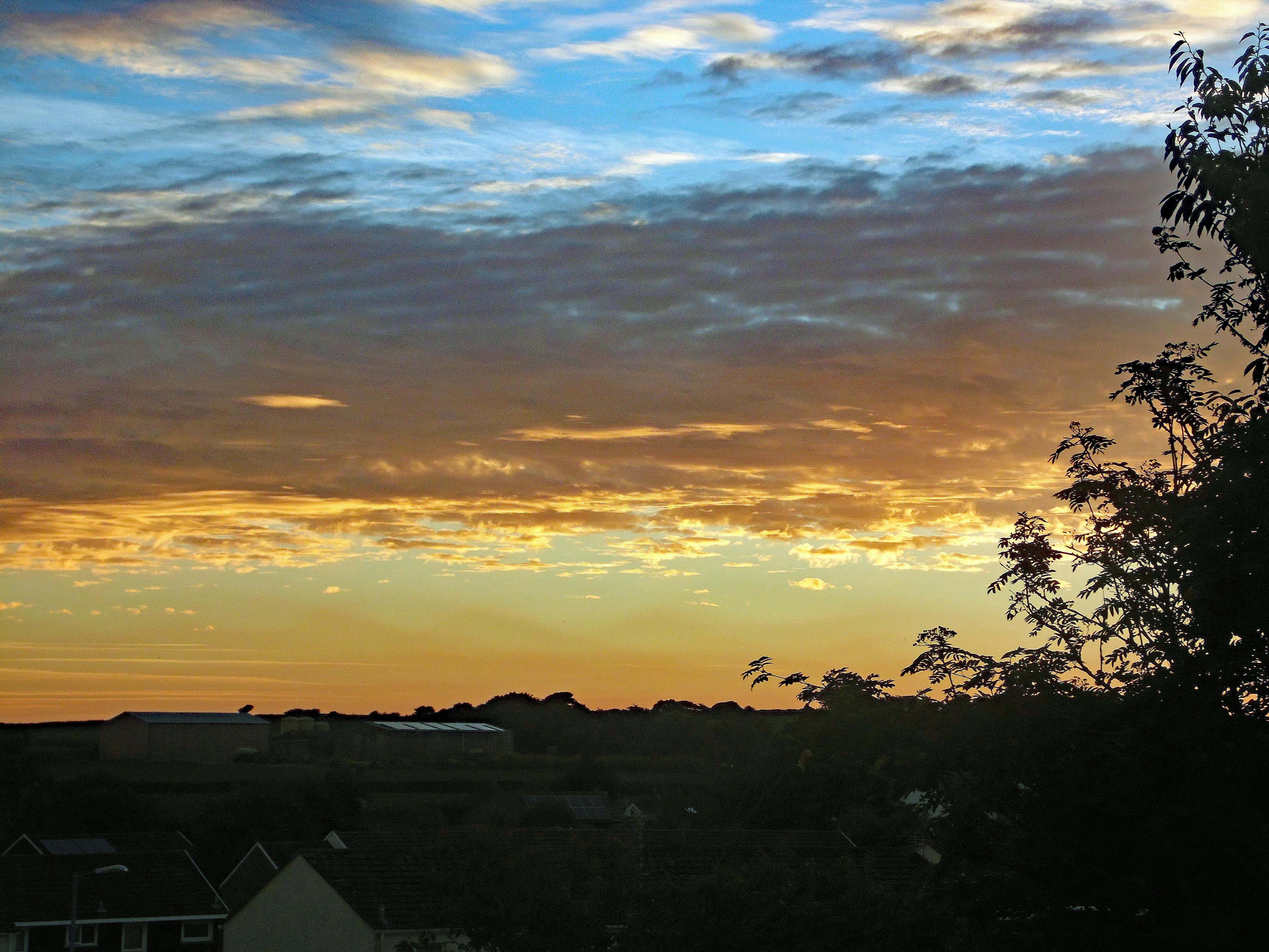 Free stock photo of Sky clouds sunset orange blue white night landscap
