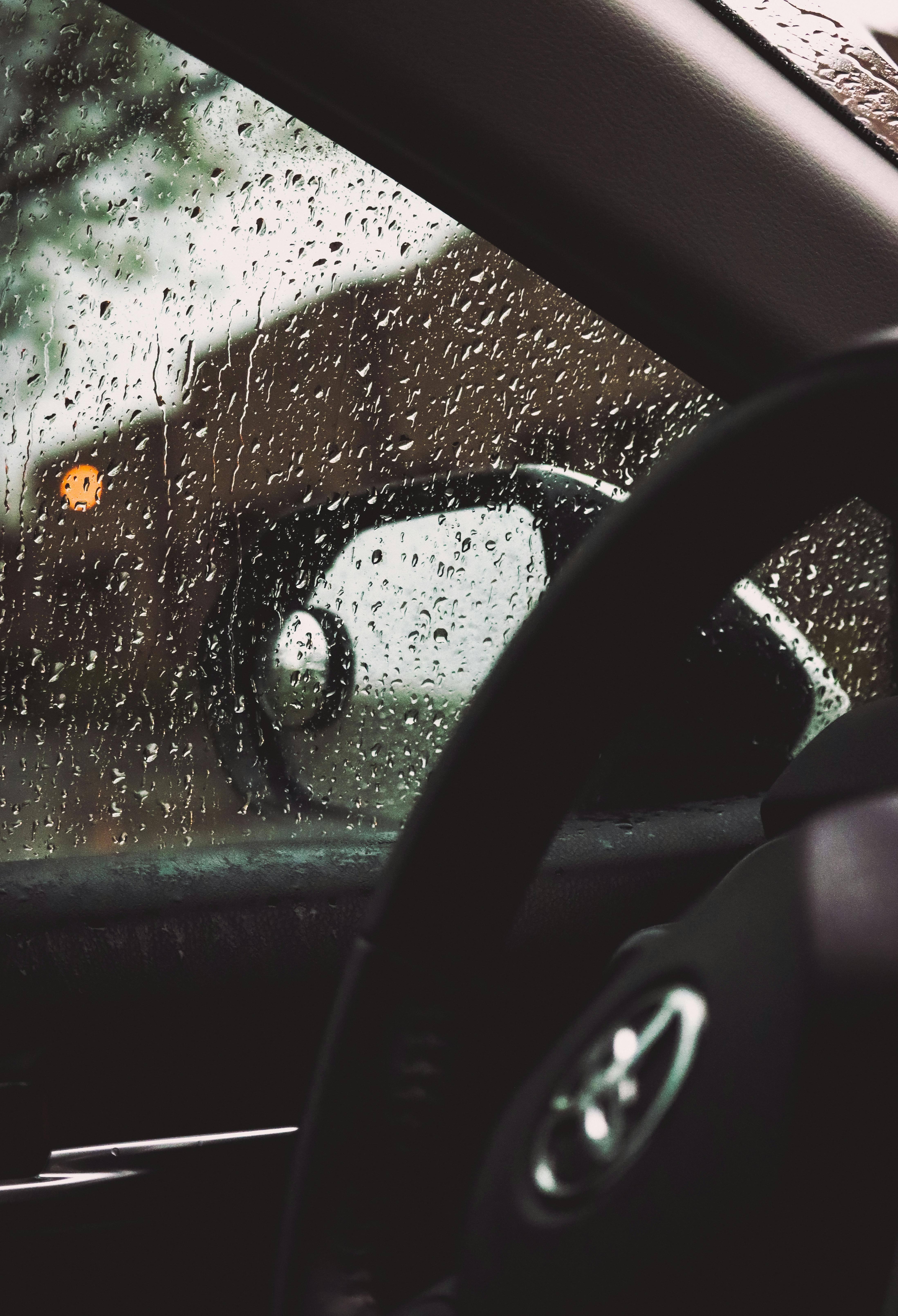 Raindrops on Car Window · Free Stock Photo
