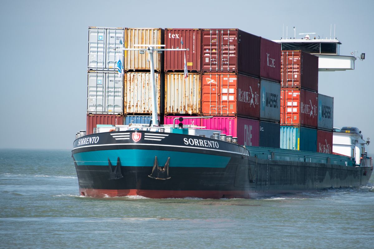 Stock photograph of a cargo ship at sea