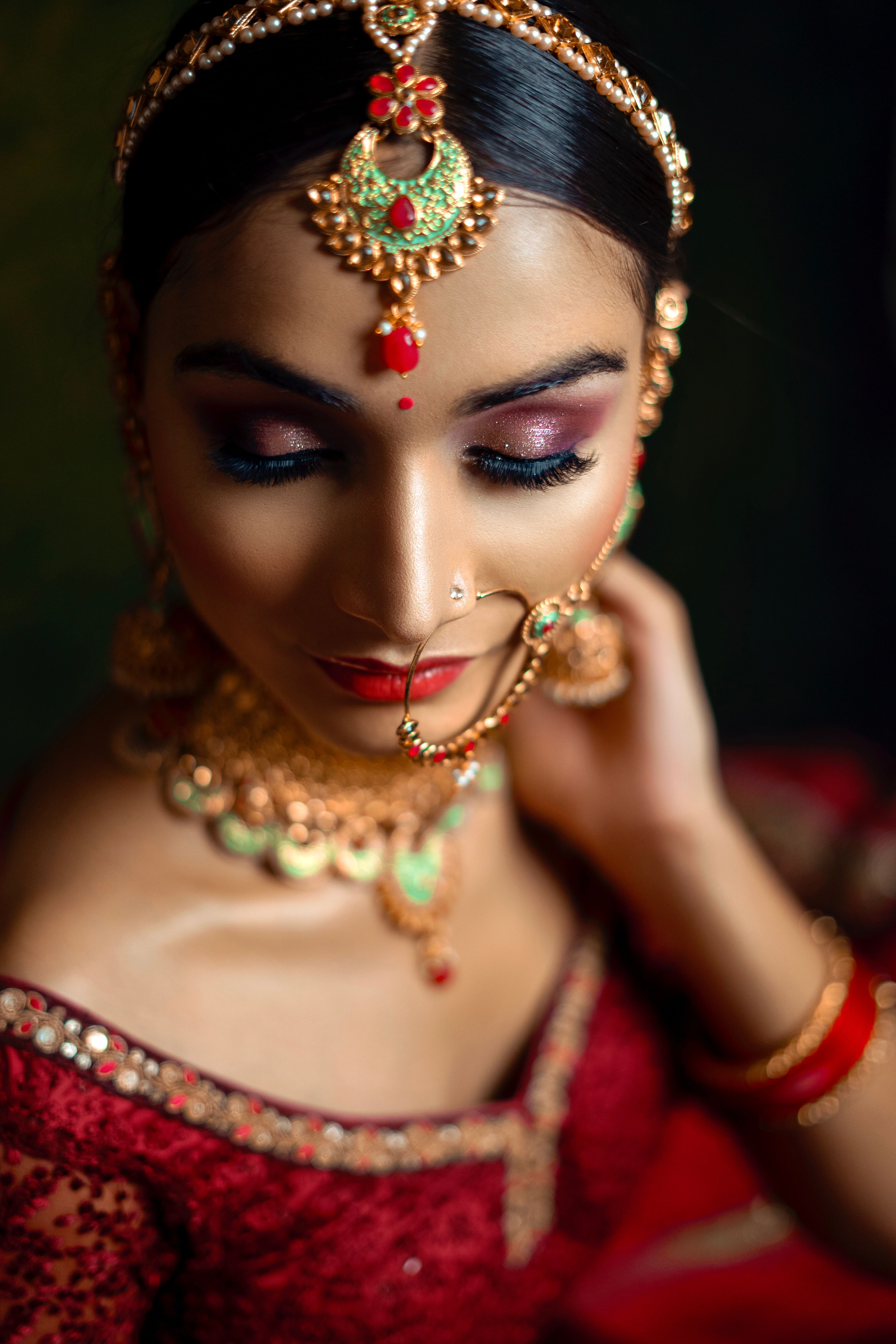 A Woman in Red and Gold Hijab · Free Stock Photo