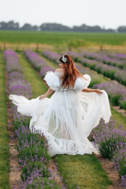 Brunette in Negligee Walking in Lavender Field 