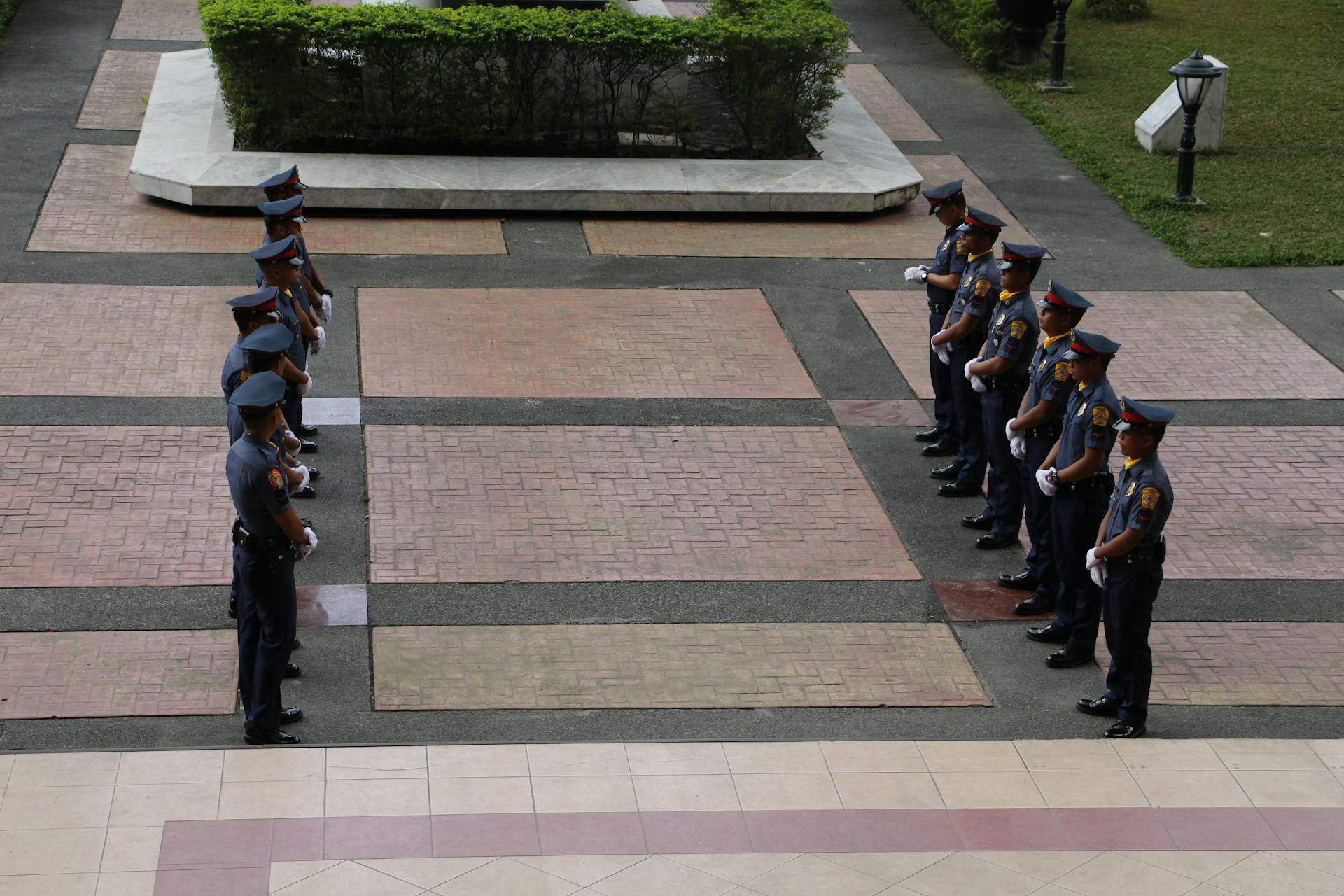 Police Officers Standing on Muster