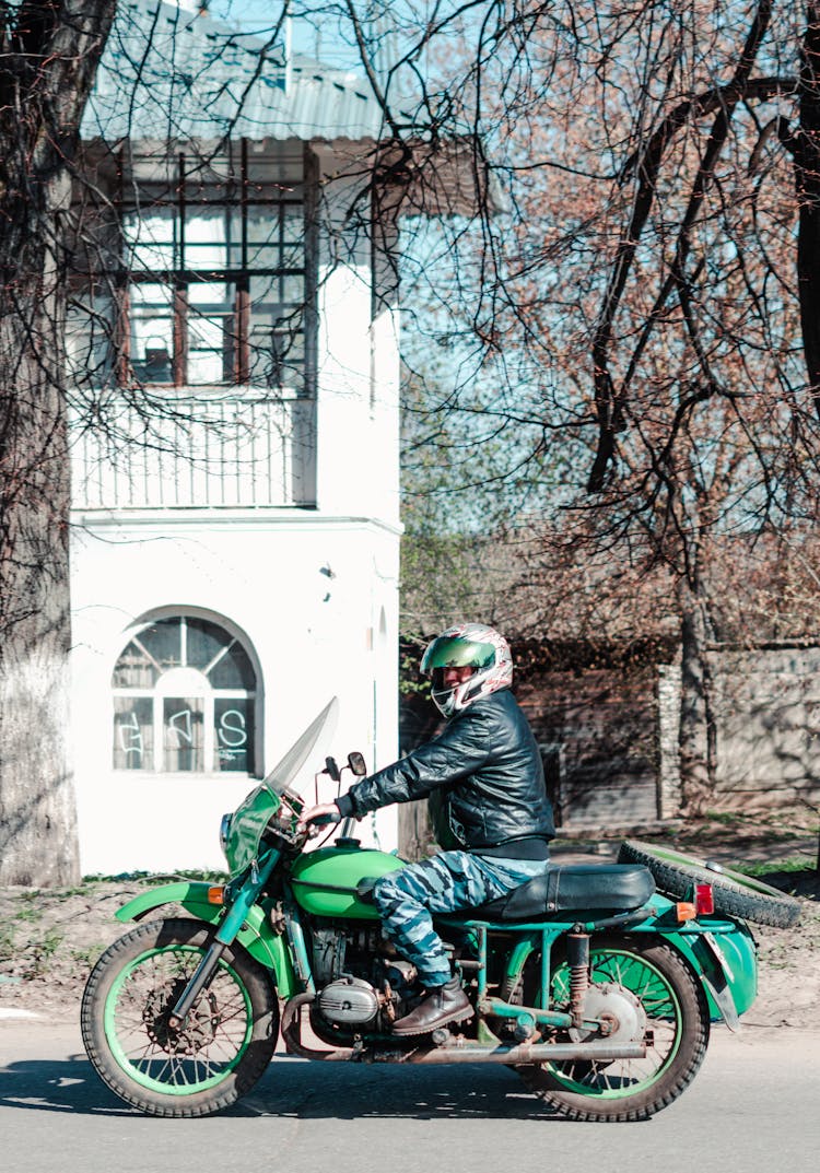 Man Riding A Motorcycle 