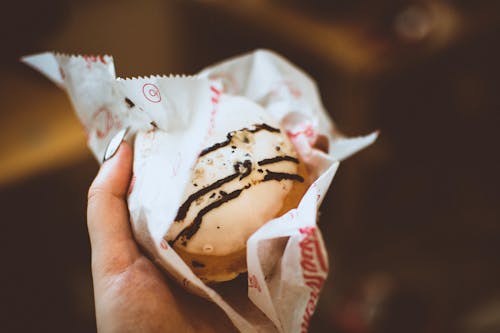 Person Holding Baked Bread