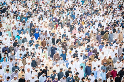 Crowd of Praying Men