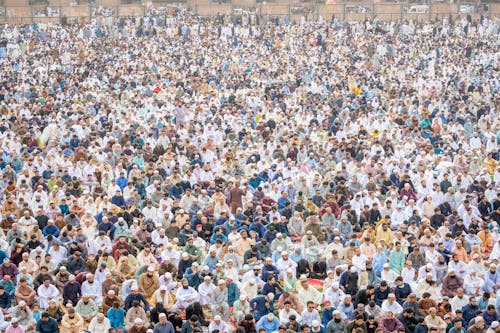 Crowd of Muslim People Praying 