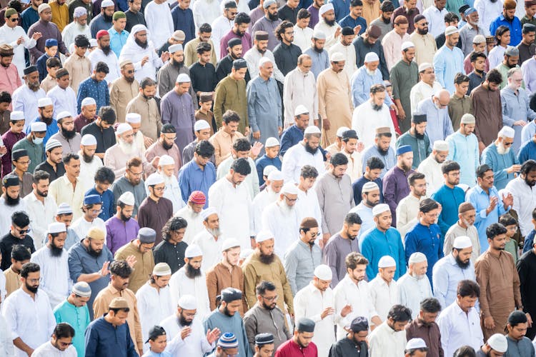 Aerial View Of A Crowd Gathered To Pray 