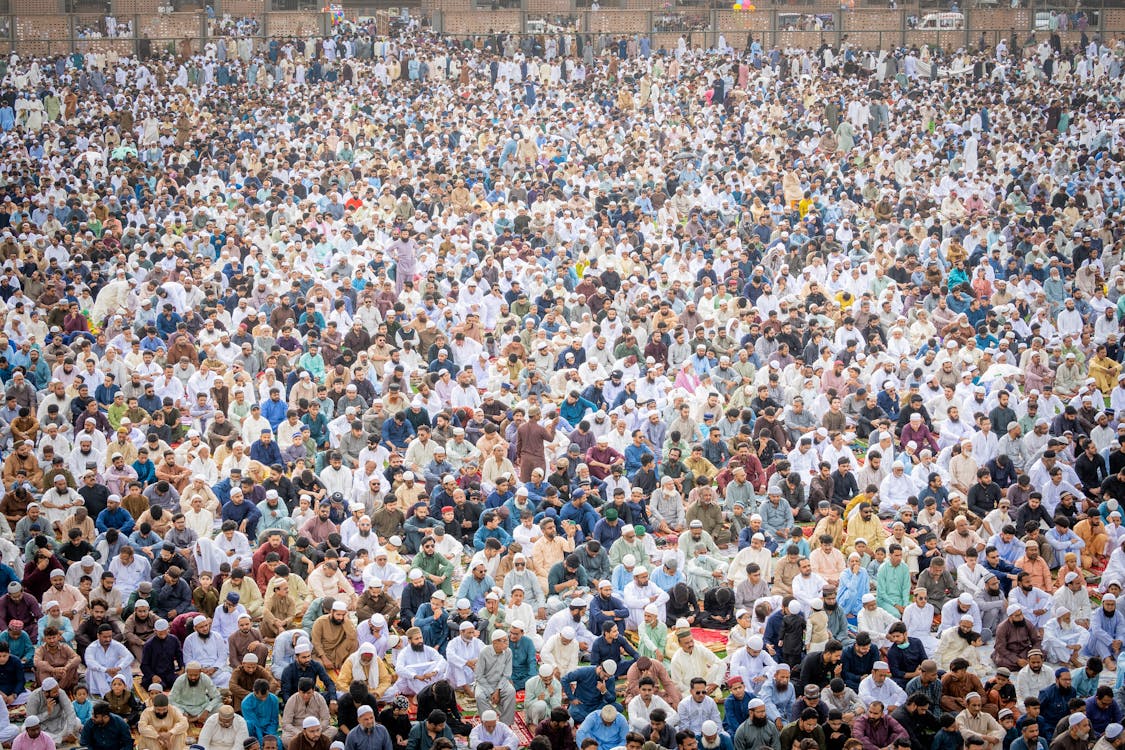 Aerial View of a Crowd Gathered to Pray · Free Stock Photo
