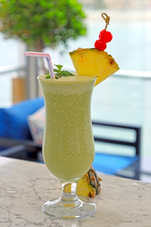 Free Straw in a Glass of Cocktail Stock Photo