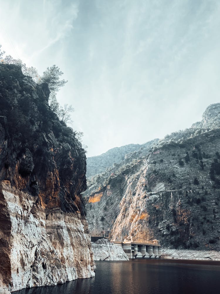 Bridge Crossing The River In A Valley