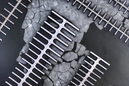 Ice Floe Crumbling in Empty Marina