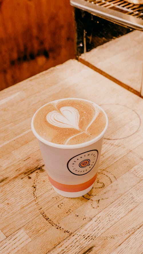 Coffee with a Heart in a Disposable Cup 