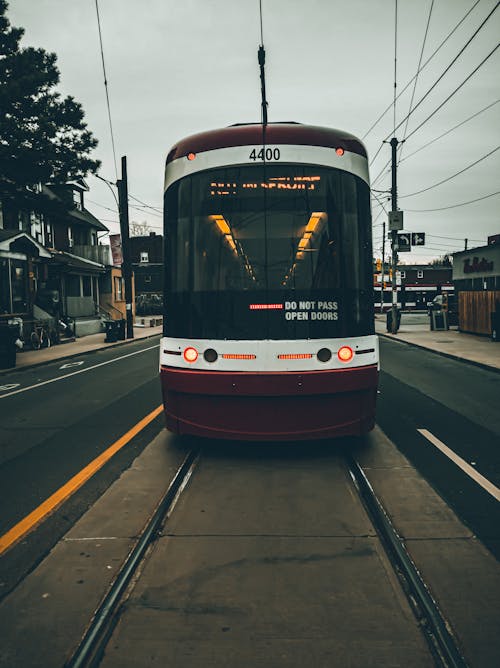 Red Tramway Moving on the Road